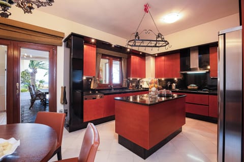 Enjoy seamless indoor-outdoor living with the kitchen opening to the garden.