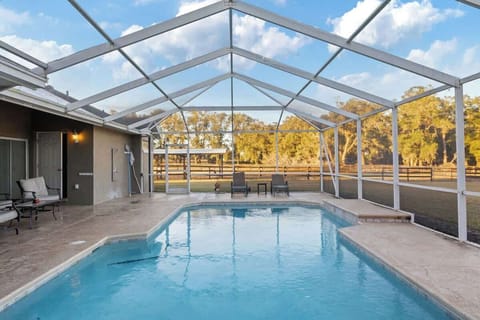 Welcome to your perfect escape with a heated pool and cover, offering year-round comfort and relaxation in beautiful Ocala #HeatedPool #LuxuryGetaway