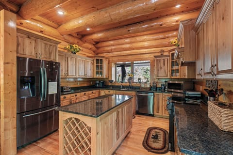 Fully stocked kitchen with granite & hickory cabinets