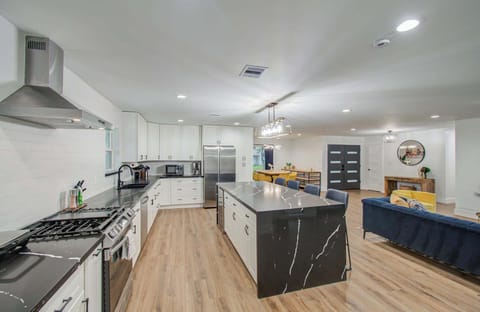 This kitchen is a chef’s dream! Fully equipped with all your cooking essentials, this spacious and upgraded kitchen features top-of-the-line everything for your culinary desires!