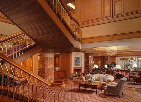 Step into a grand lobby lounge with timeless warmth.
