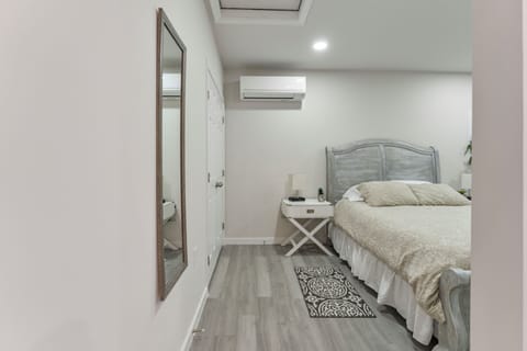 enjoy a peaceful night's sleep in this inviting bedroom with soothing cozy decor