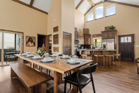We can sleep 14 guests and you can all dine together! The table comfortably seats 10 + the island seats 4.  Our guests LOVE this because many other vacation rentals have tables that only seat 6-8 for homes this size. 