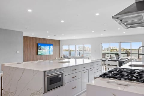 Sophisticated culinary space with rich timber elements and breathtaking metropolitan vistas