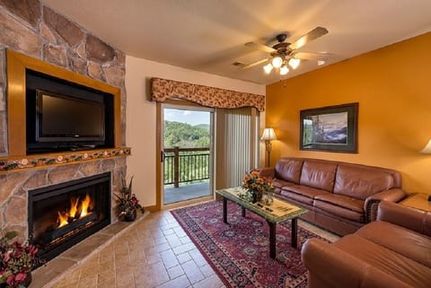 Large unit - living area with balcony, flat screen TV and fireplace 