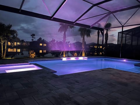 Beautiful pool and spa at night