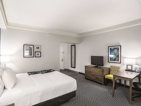 Settle in with a roomy layout, desk, and easy TV nights.