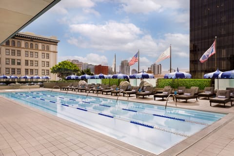 Dive into sunlit laps, then stretch out on plush loungers.