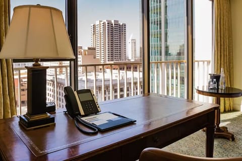Work comfortably by sunlit windows with inspiring skyline views.