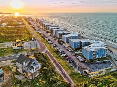 Located just off the dunes with easy dedicated access.  Luxury home with a yard full of games.  Plenty of parking. Did I mention the Ocean?