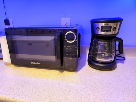 Kitchenette area with Full size fridge and washer and dryer