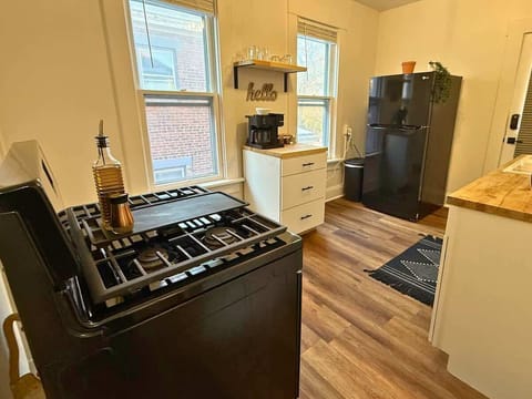 Elevate every dish with premium appliances like an LG stainless steel oven and a sleek electric stove