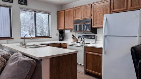 Open concept kitchen, living room, and dining area- perfect for groups