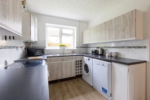 Fully equipped kitchen with dishwasher, fridge/freezer, washing machine and dryer.