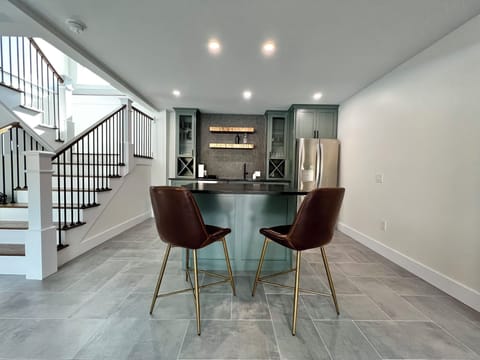 seating around island downstairs by kitchenette