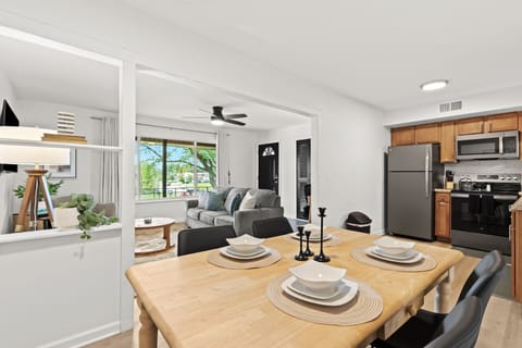 Gather for a meal at the cozy dining table set just off the kitchen.