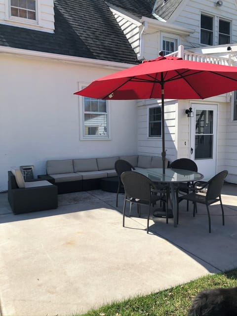 Private rear patio includes beautiful garden paths.