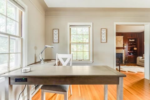 Dedicated office space includes basic office supplies and printer.