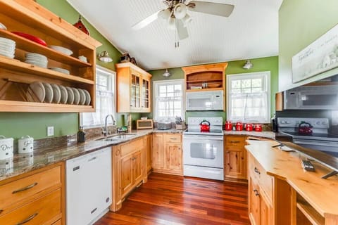 Full kitchen includes a well-stocked pantry with everyday cooking essentials.