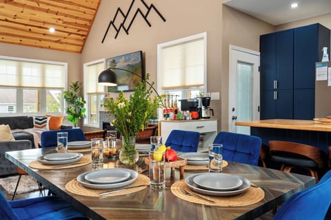 As you walk in the door, you'll be greeted by the beauty of the open plan kitchen and living room with vaulted wood ceilings. Take a breath and relax!