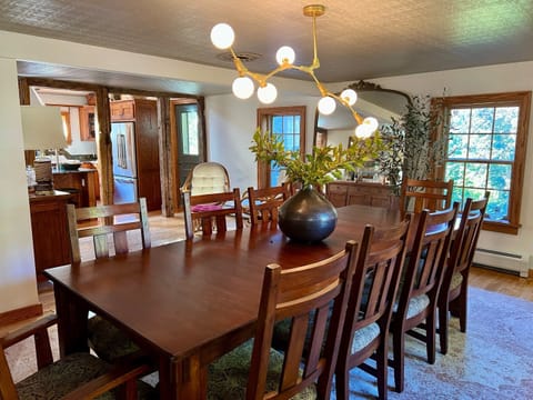 Dining table seats 10 & is where we enjoy family meals & our evening games.