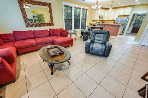 - Comfortable living space with plenty of seating for relaxation and conversation - Open layout flows into the kitchen, making it perfect for gatherings and movie nights - Large windows bring in natural light, creating a warm and inviting atmosphere