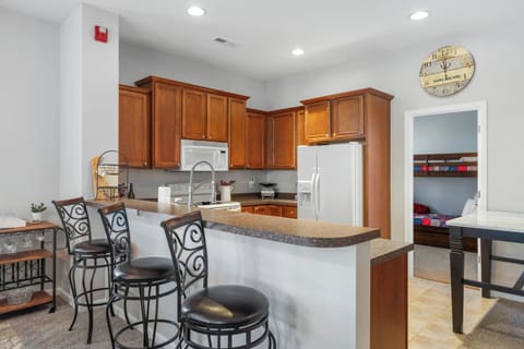 The open, airy kitchen offers ample space & all the comforts of home