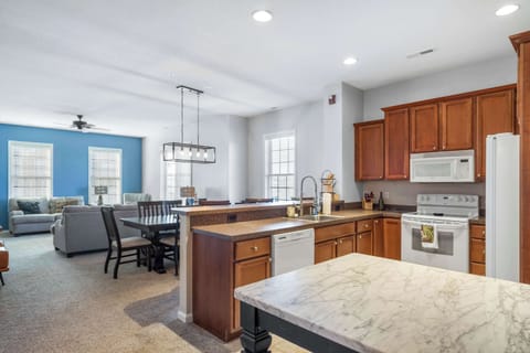 The open, airy kitchen offers ample space & all the comforts of home