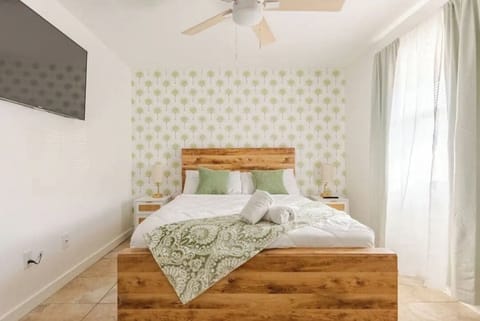 Cozy bed with your power adapters and personal lamps