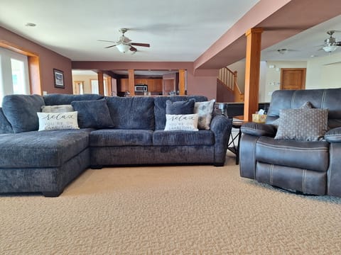 New sofa with queen sleeper.
New Rocking chair that swivels