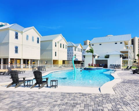 The Boathouse 4/3.5. Boat Slip Included! Stunning Zero Entry Pool.