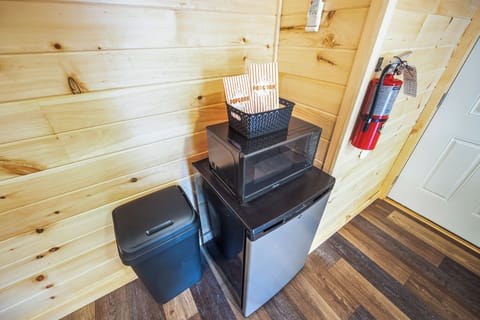 Pop some popcorn for the movie. Store your sodas and drinks for the movie night.