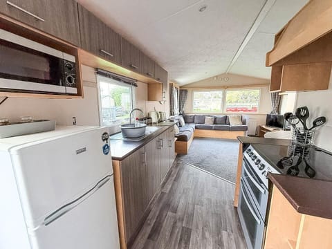 Bright, airy kitchen with modern appliances and cozy dining nook
