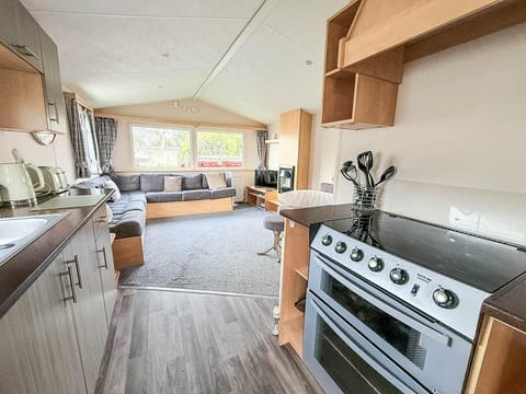 Bright, open kitchen and living area with cozy seating