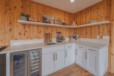 Wet bar fun! Wine frig, blender, bar tools, and board games!