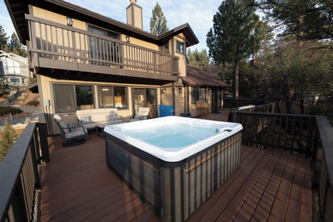 Relax on the huge patio deck & luxury hot tub with endless views of the slopes!