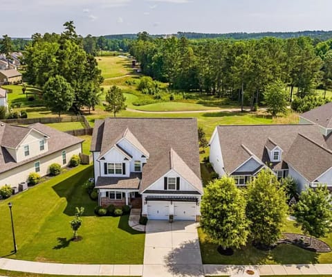Aerial view of home looking out over the 18th tee