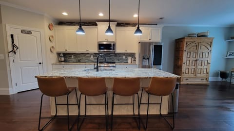 Kitchen and partial view of office