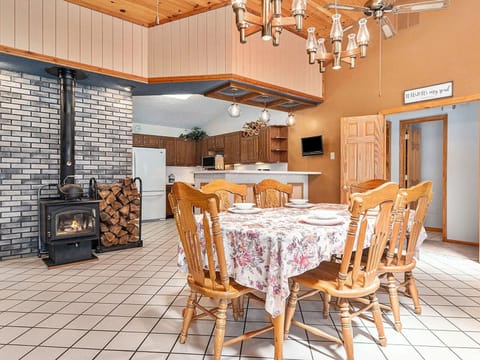 Gas stove for extra heat in the winter. House also has boiler system for heat