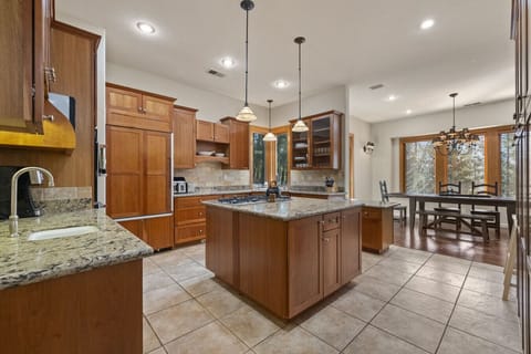 Gourmet kitchen with plenty of utensils, cookware, standing mixer and even an air fryer