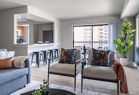 This inviting living room is the perfect spot for you to relax, whether it's for a quiet evening or a fun game night with friends. You’ll feel right at home here!