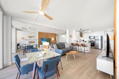 Overview of the dining area, living area, and kitchen