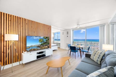 Beautiful 1-bedroom unit in Ilikai Marina with stunning ocean views. Features a 65" smart TV and a pull-out sleeper sofa in the living room.