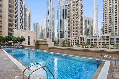 Pool Oasis: Dive into luxury with stunning skyline views and refreshing waters at your doorstep!
