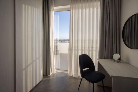 Single bedroom leading onto the terrace