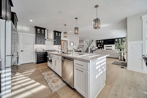 Bright open kitchen with large island and stylish modern living space