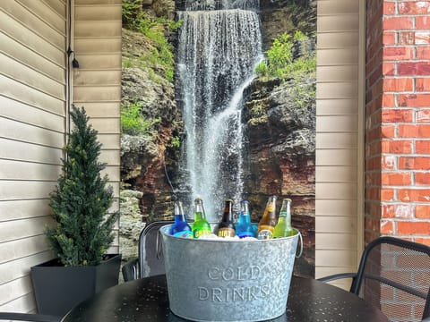 Grab a cold one by the waterfall!