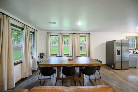 The dining room table includes 8 chairs for maximum seating options.