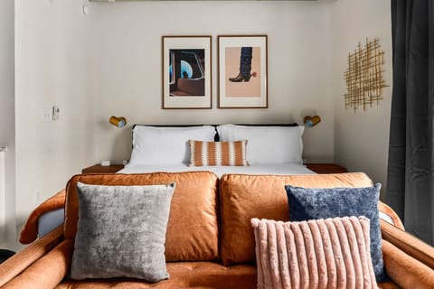 Get a restful night's sleep on a memory foam bed in this cozy bedroom.