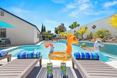 Dive into vacation mode with this sparkling pool